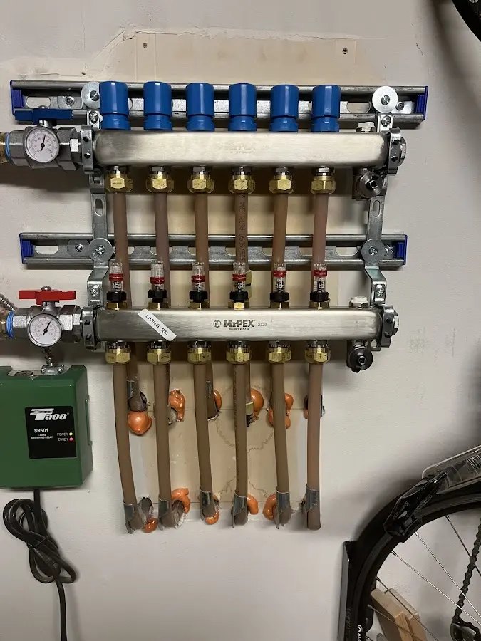 Plumber performing Gas Line Installation at a residential property in Battle Creek